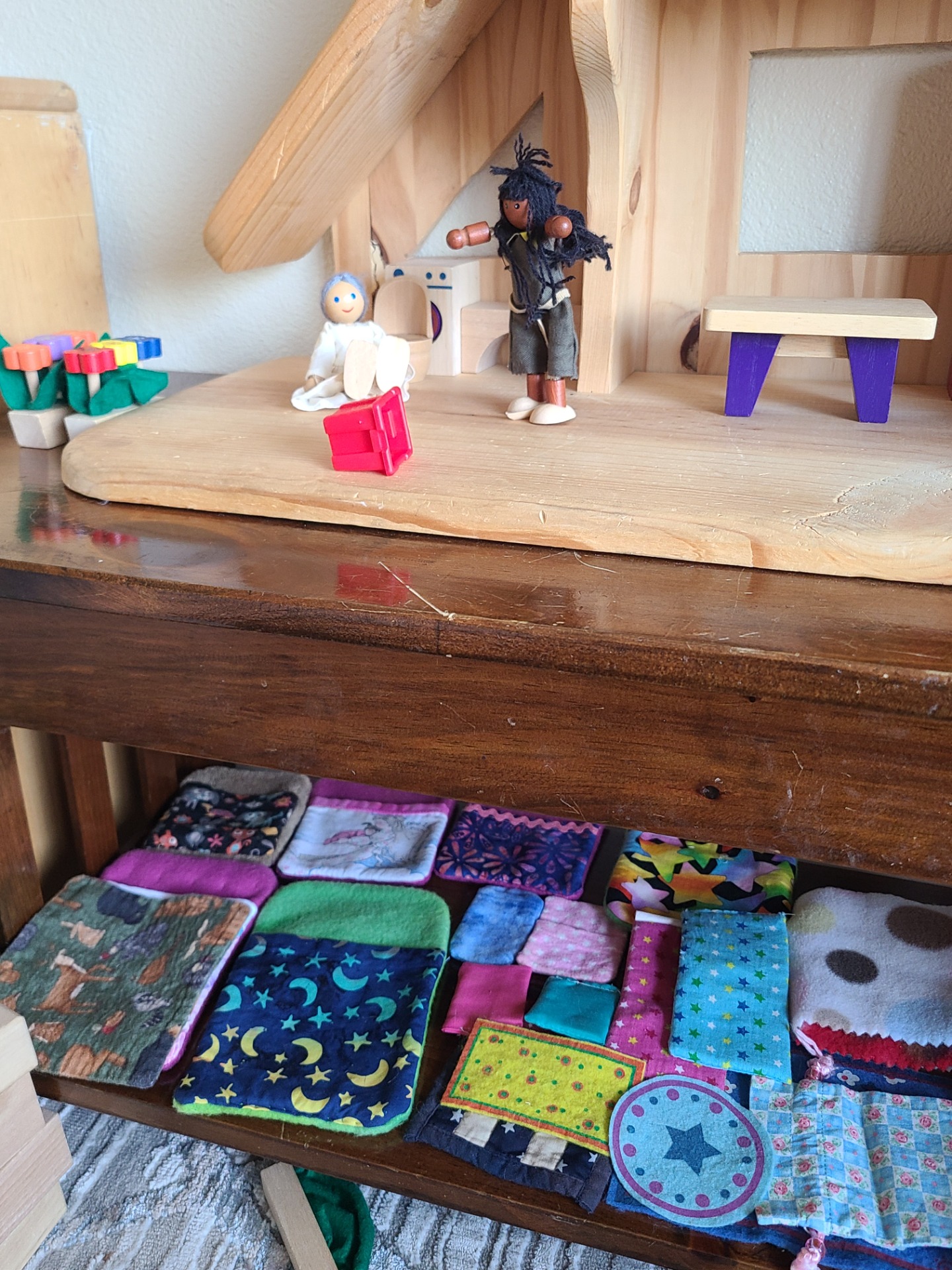 Dollhouse scene set up by 6 year old child.